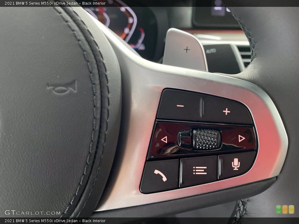 Black Interior Steering Wheel for the 2021 BMW 5 Series M550i xDrive Sedan #141812158
