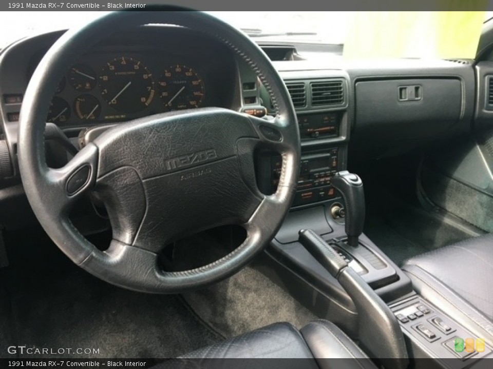 Black Interior Dashboard for the 1991 Mazda RX-7 Convertible #141883185