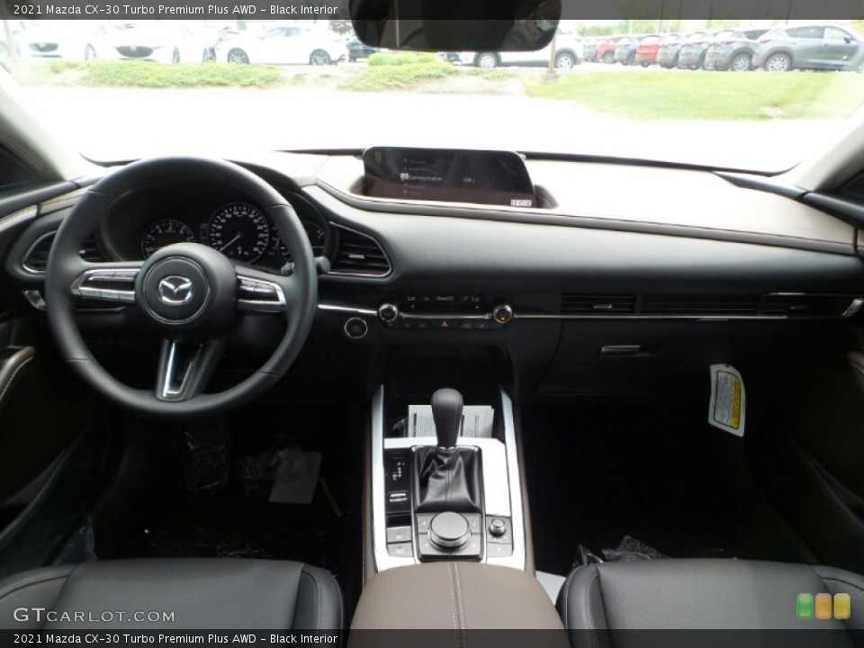 Black Interior Dashboard for the 2021 Mazda CX-30 Turbo Premium Plus AWD #141983705