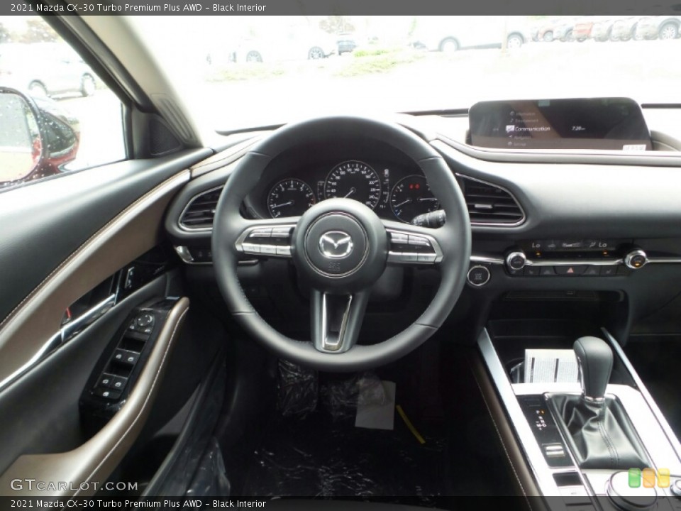 Black Interior Steering Wheel for the 2021 Mazda CX-30 Turbo Premium Plus AWD #141983726