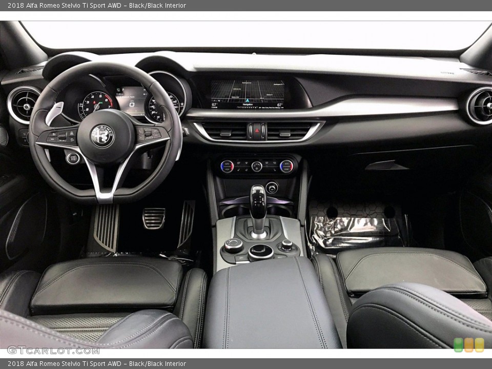 Black/Black Interior Dashboard for the 2018 Alfa Romeo Stelvio Ti Sport AWD #141999189