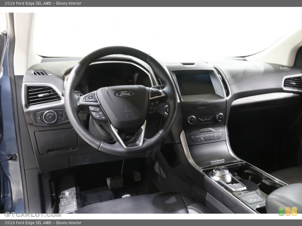 Ebony Interior Dashboard for the 2019 Ford Edge SEL AWD #142003104