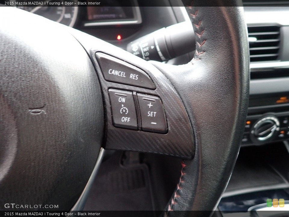 Black Interior Steering Wheel for the 2015 Mazda MAZDA3 i Touring 4 Door #142044826