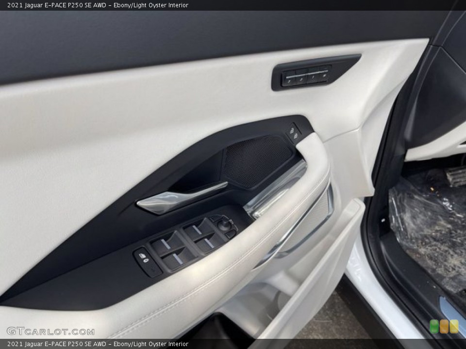 Ebony/Light Oyster Interior Door Panel for the 2021 Jaguar E-PACE P250 SE AWD #142218880