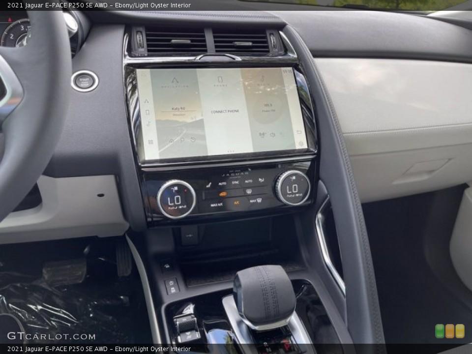 Ebony/Light Oyster Interior Controls for the 2021 Jaguar E-PACE P250 SE AWD #142218922