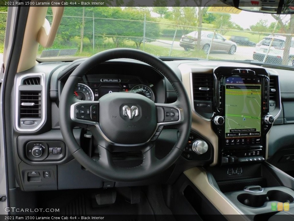 Black Interior Dashboard for the 2021 Ram 1500 Laramie Crew Cab 4x4 #142272958