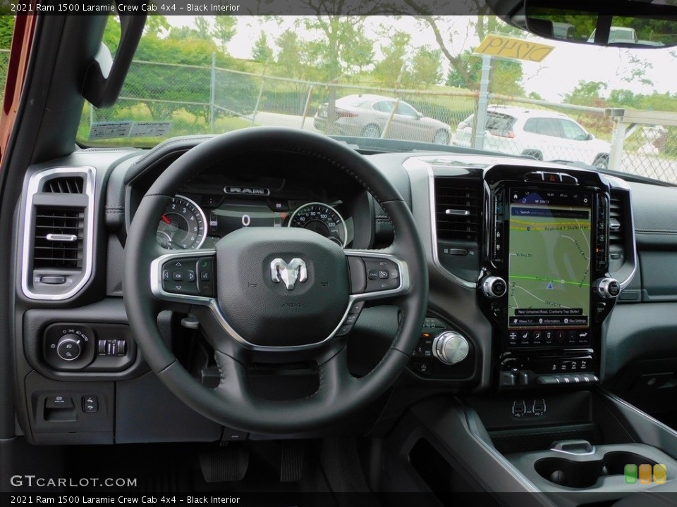 Black Interior Dashboard for the 2021 Ram 1500 Laramie Crew Cab 4x4 #142273402
