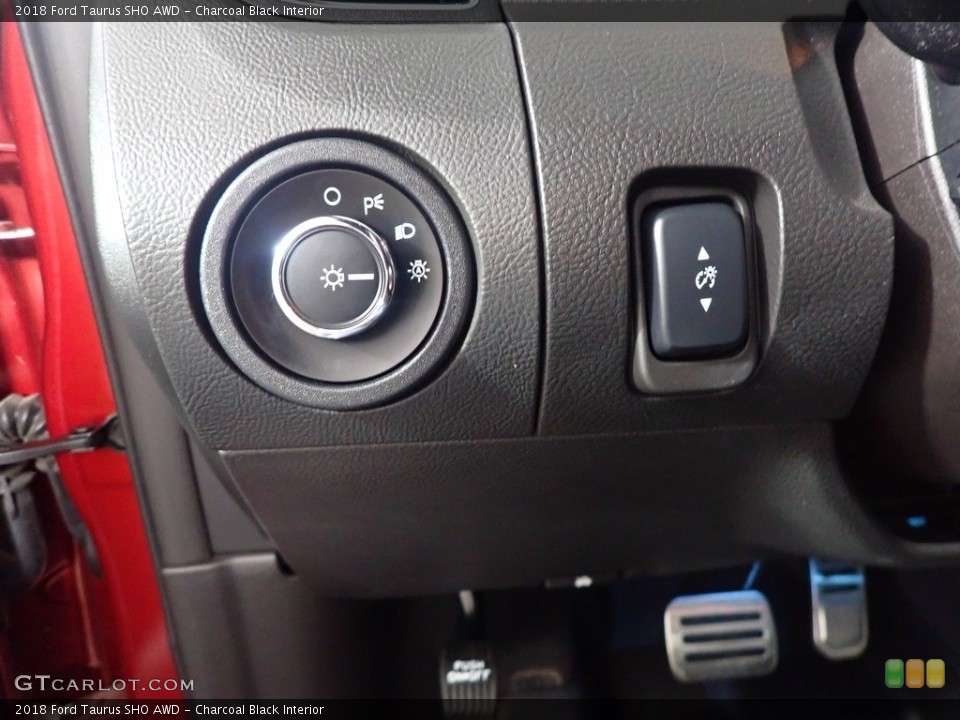 Charcoal Black Interior Controls for the 2018 Ford Taurus SHO AWD #142319943