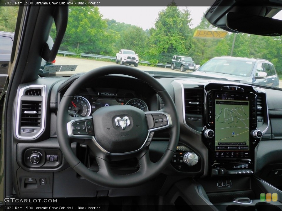 Black Interior Dashboard for the 2021 Ram 1500 Laramie Crew Cab 4x4 #142399161