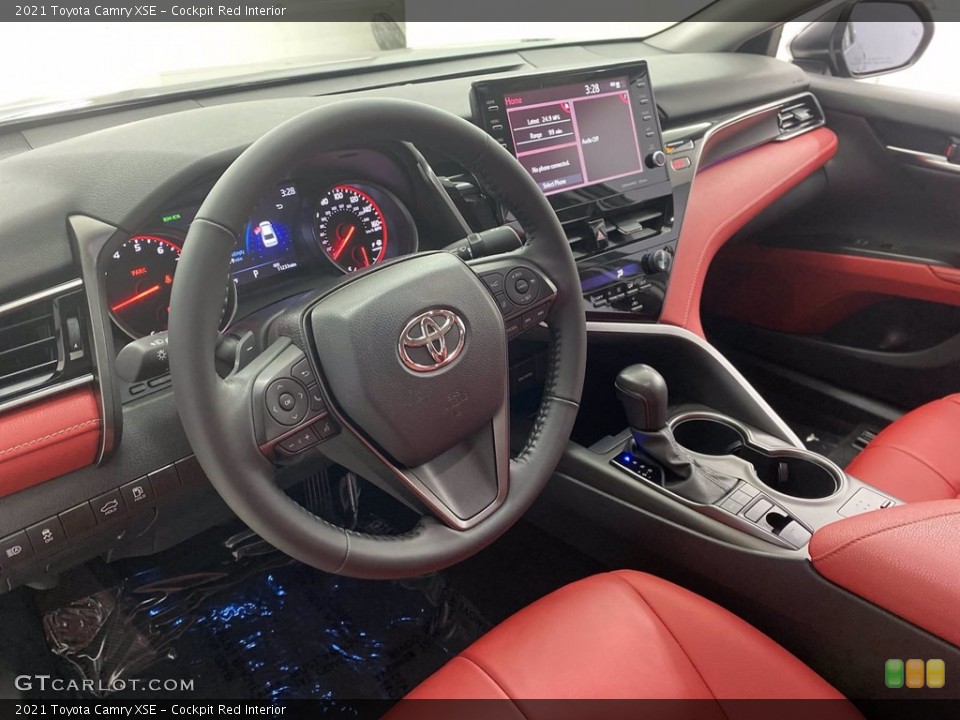Cockpit Red Interior Photo for the 2021 Toyota Camry XSE #142538892