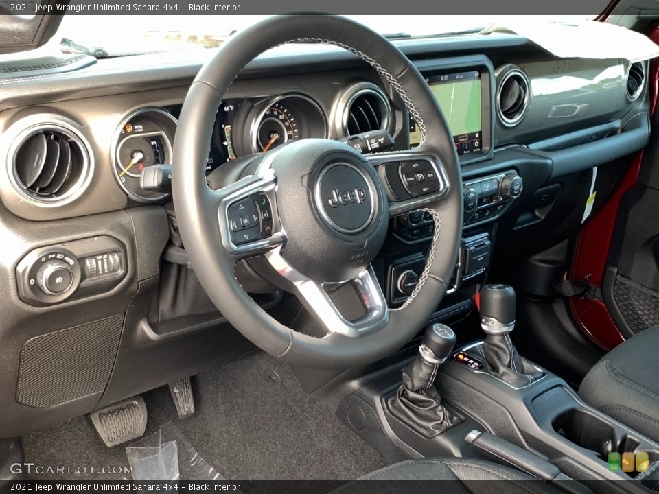 Black Interior Dashboard for the 2021 Jeep Wrangler Unlimited Sahara 4x4 #142587934