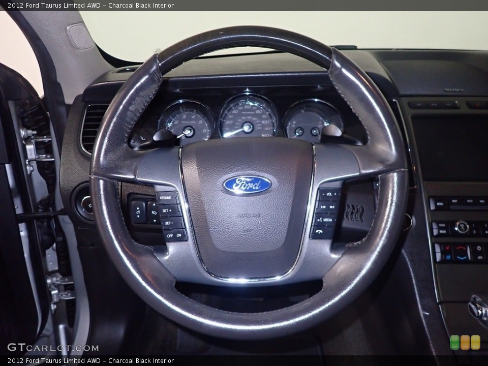 Charcoal Black Interior Steering Wheel for the 2012 Ford Taurus Limited AWD #142676069