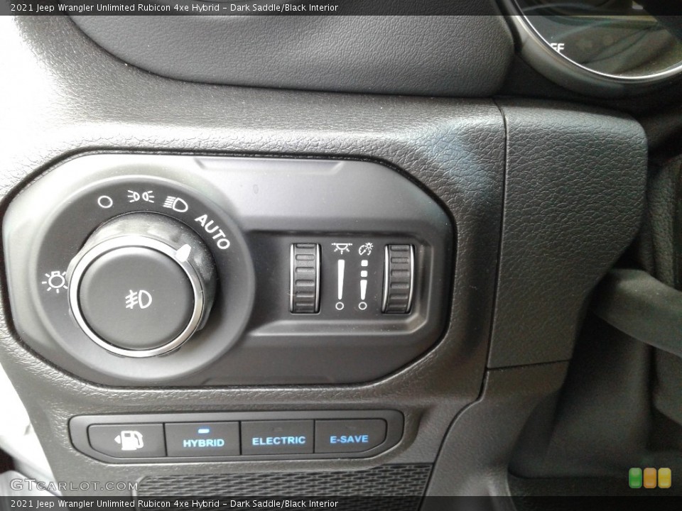 Dark Saddle/Black Interior Controls for the 2021 Jeep Wrangler Unlimited Rubicon 4xe Hybrid #142709243