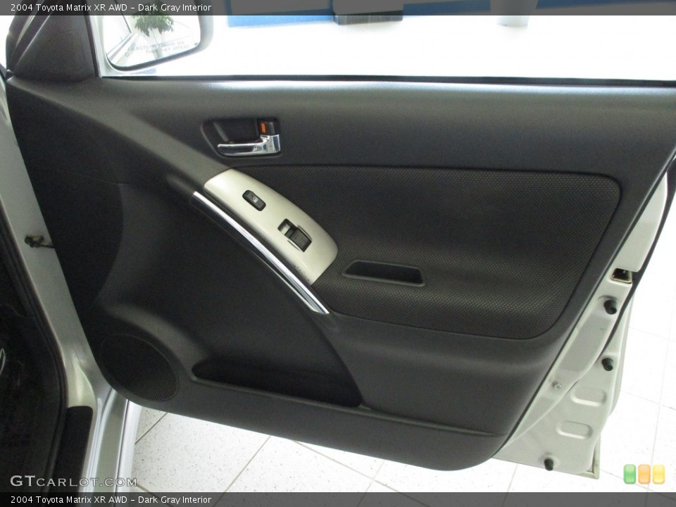 Dark Gray Interior Door Panel for the 2004 Toyota Matrix XR AWD #142787974