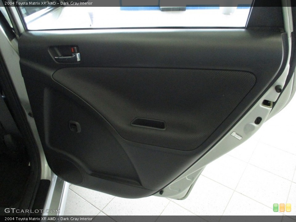 Dark Gray Interior Door Panel for the 2004 Toyota Matrix XR AWD #142788016