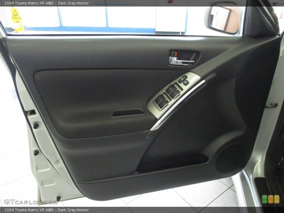 Dark Gray Interior Door Panel for the 2004 Toyota Matrix XR AWD #142788121