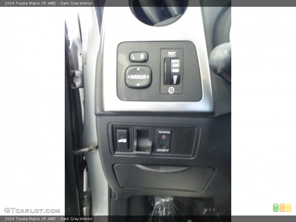 Dark Gray Interior Controls for the 2004 Toyota Matrix XR AWD #142788154