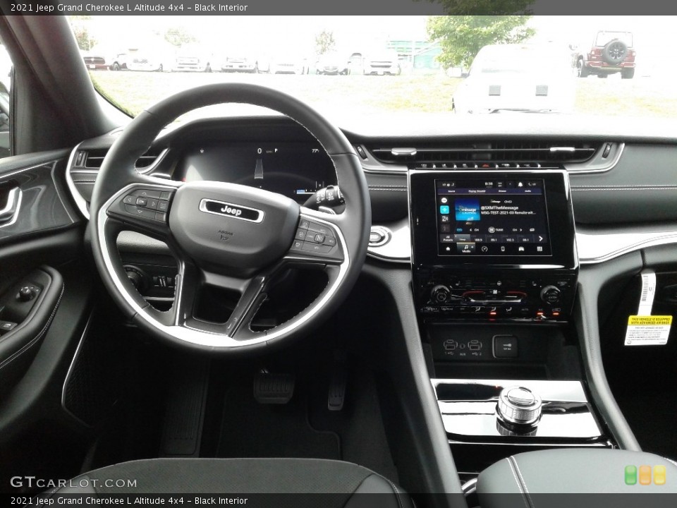 Black Interior Dashboard for the 2021 Jeep Grand Cherokee L Altitude 4x4 #142797158