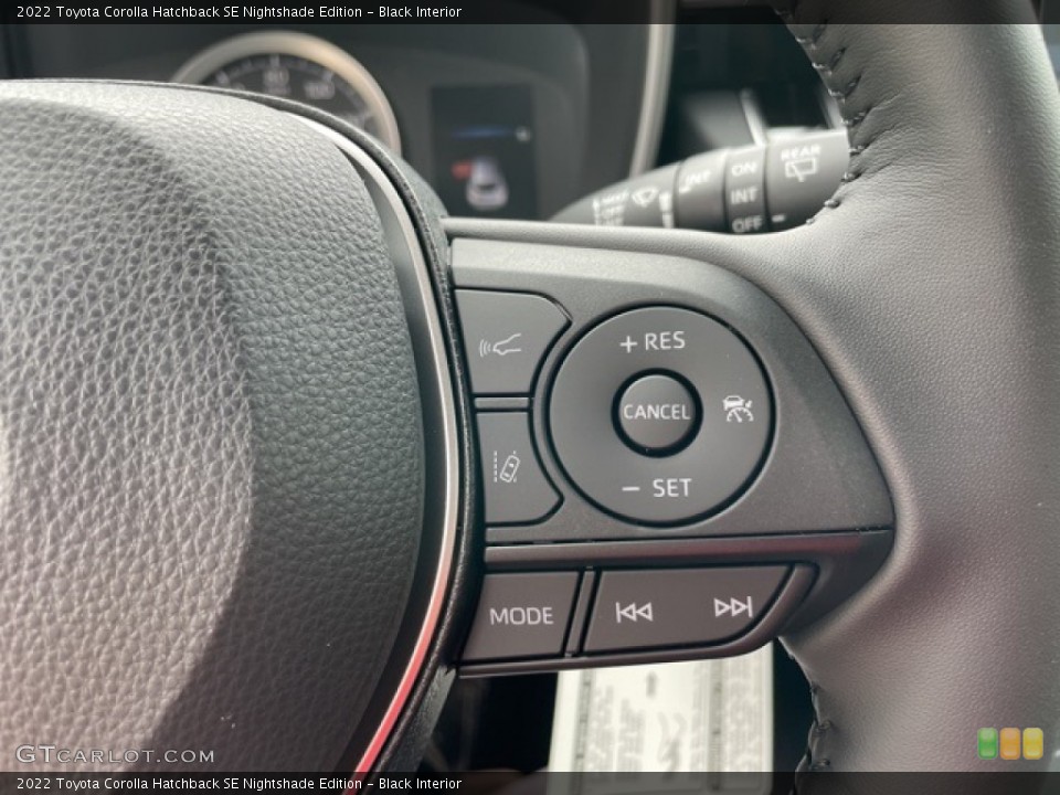 Black Interior Steering Wheel for the 2022 Toyota Corolla Hatchback SE Nightshade Edition #142839285