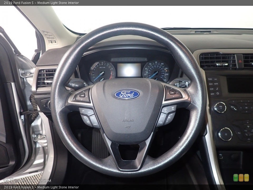 Medium Light Stone Interior Steering Wheel for the 2019 Ford Fusion S #142918549