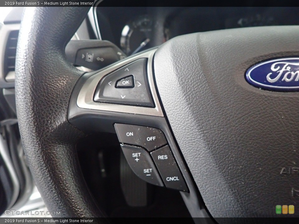 Medium Light Stone Interior Steering Wheel for the 2019 Ford Fusion S #142918597