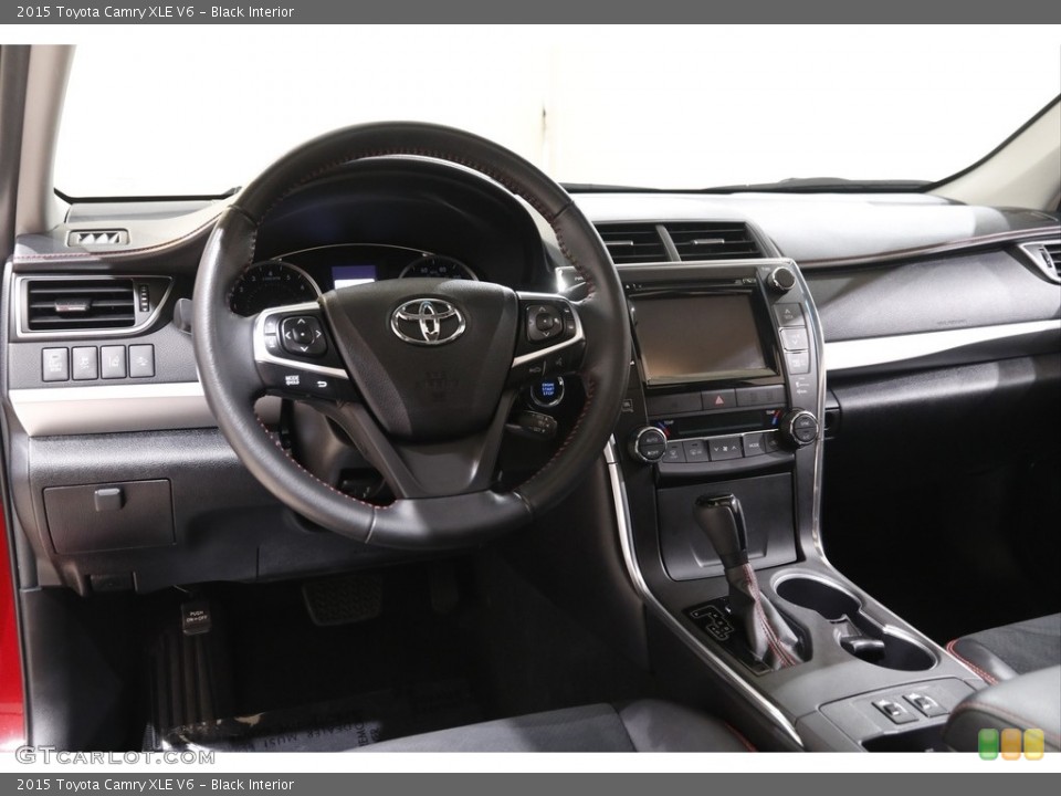Black Interior Dashboard for the 2015 Toyota Camry XLE V6 #142992559