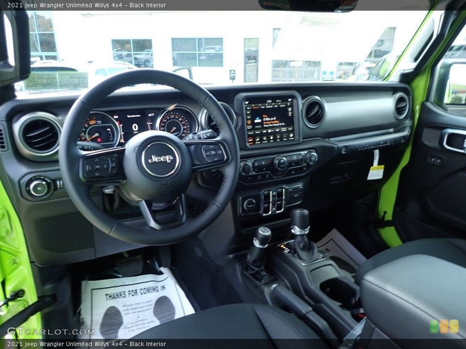 Black Interior Photo for the 2021 Jeep Wrangler Unlimited Willys 4x4 #143182315