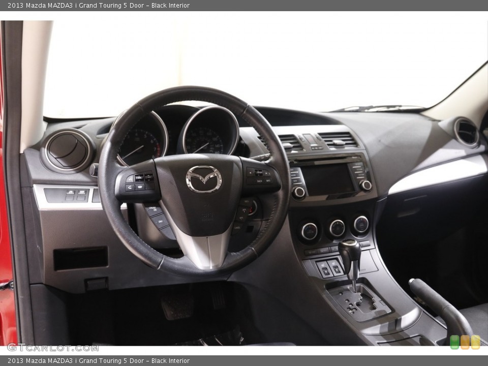 Black Interior Dashboard for the 2013 Mazda MAZDA3 i Grand Touring 5 Door #143305656