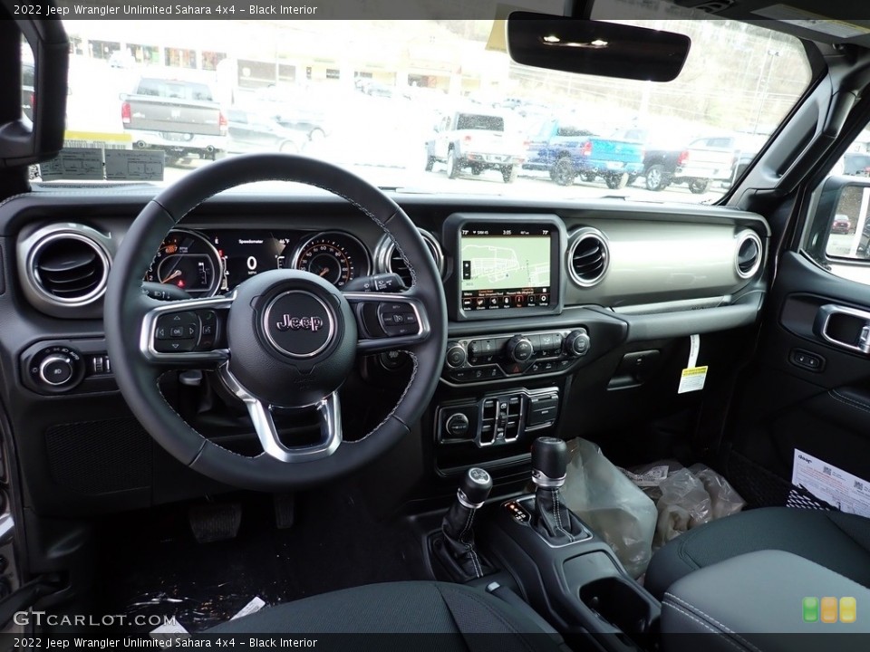 Black Interior Dashboard for the 2022 Jeep Wrangler Unlimited Sahara 4x4 #143567203
