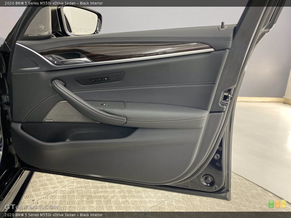 Black Interior Door Panel for the 2020 BMW 5 Series M550i xDrive Sedan #143584811