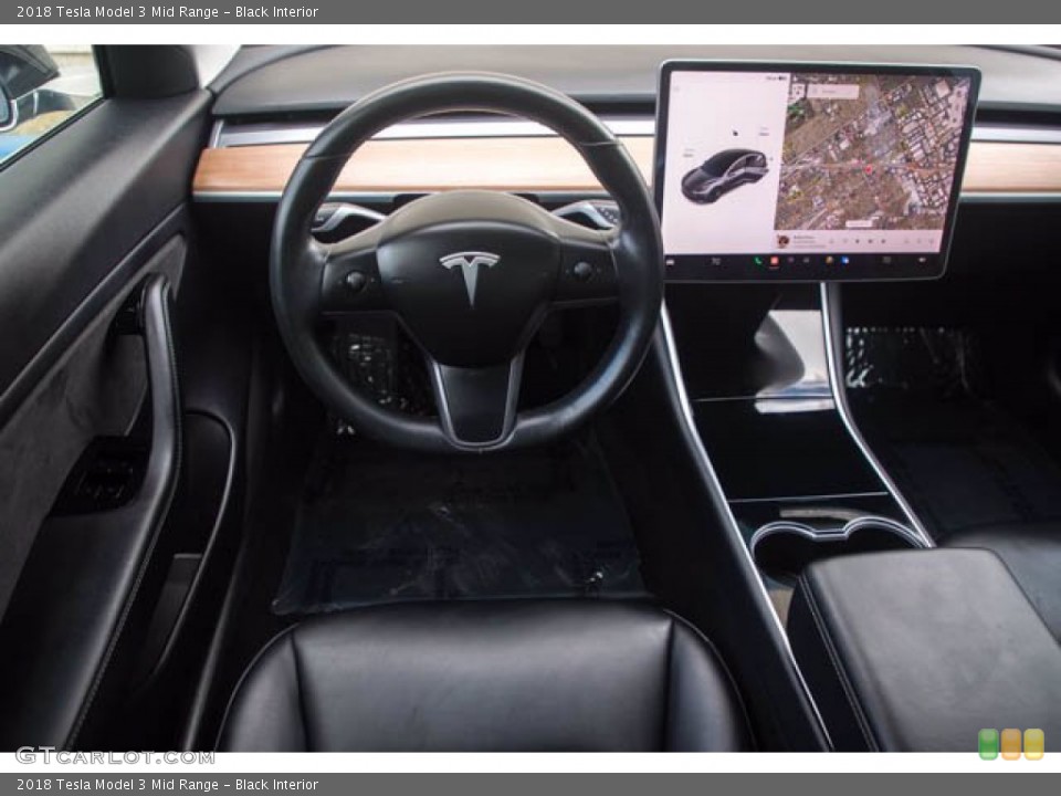 Black Interior Photo for the 2018 Tesla Model 3 Mid Range #143597696
