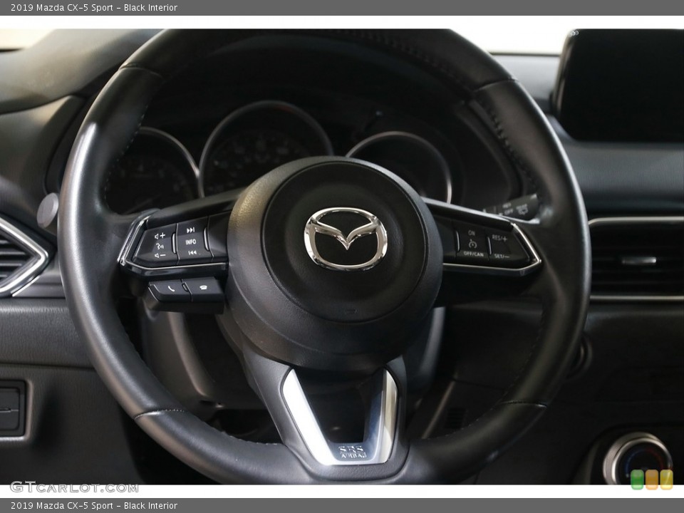 Black Interior Steering Wheel for the 2019 Mazda CX-5 Sport #143605379