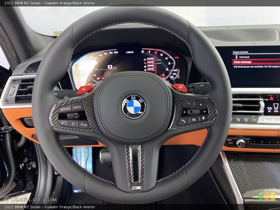 Kyalami Orange/Black Interior Steering Wheel for the 2022 BMW M3 Sedan #143618820
