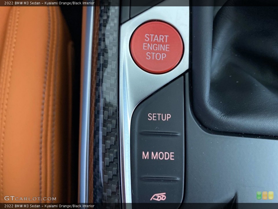 Kyalami Orange/Black Interior Controls for the 2022 BMW M3 Sedan #143619062