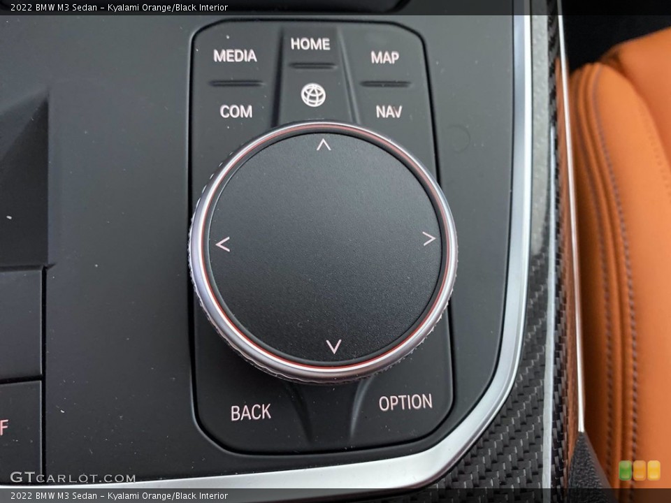 Kyalami Orange/Black Interior Controls for the 2022 BMW M3 Sedan #143619090