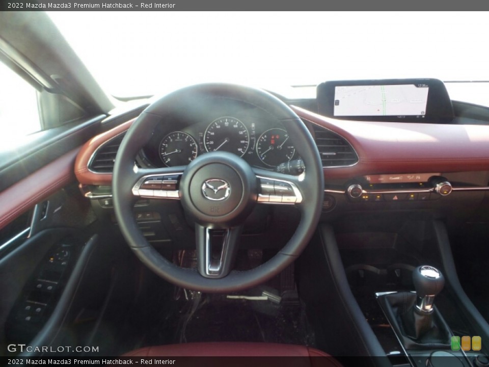 Red Interior Dashboard for the 2022 Mazda Mazda3 Premium Hatchback #143690709