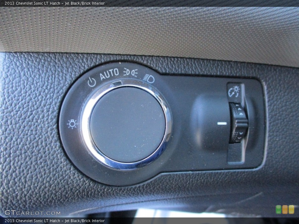 Jet Black/Brick Interior Controls for the 2013 Chevrolet Sonic LT Hatch #143695278