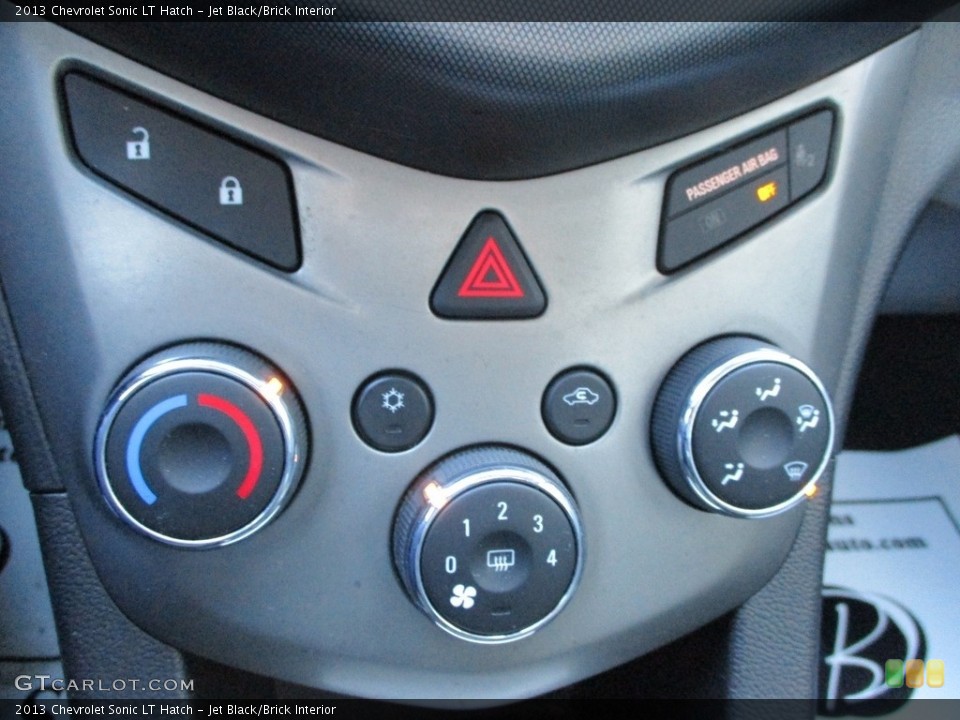 Jet Black/Brick Interior Controls for the 2013 Chevrolet Sonic LT Hatch #143695416