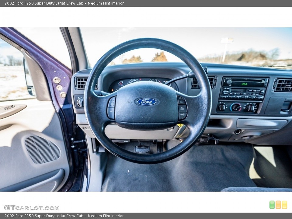 Medium Flint Interior Steering Wheel for the 2002 Ford F250 Super Duty Lariat Crew Cab #143712031