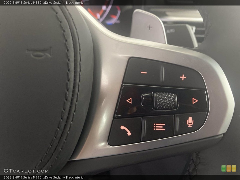 Black Interior Steering Wheel for the 2022 BMW 5 Series M550i xDrive Sedan #143747654