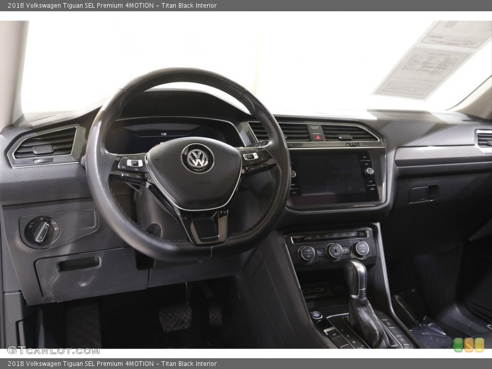 Titan Black Interior Dashboard for the 2018 Volkswagen Tiguan SEL Premium 4MOTION #143834131