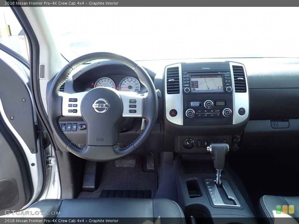 Graphite Interior Dashboard for the 2018 Nissan Frontier Pro-4X Crew Cab 4x4 #143927950