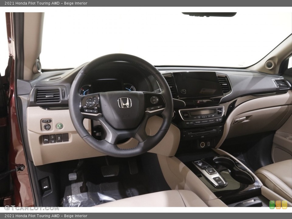 Beige Interior Dashboard for the 2021 Honda Pilot Touring AWD #143940477