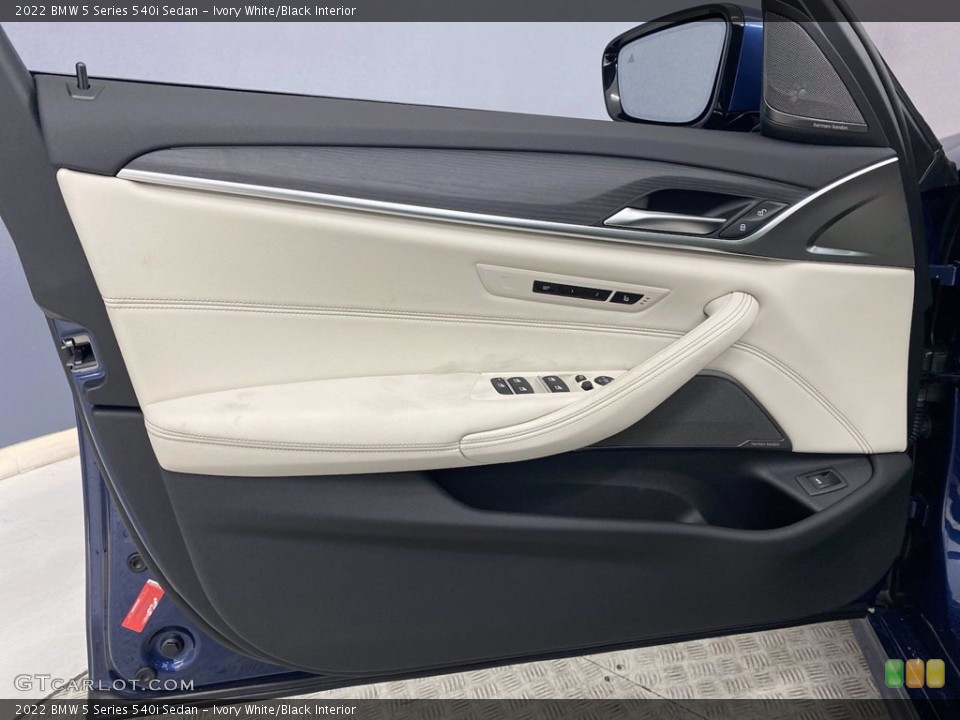 Ivory White/Black Interior Door Panel for the 2022 BMW 5 Series 540i Sedan #143940758