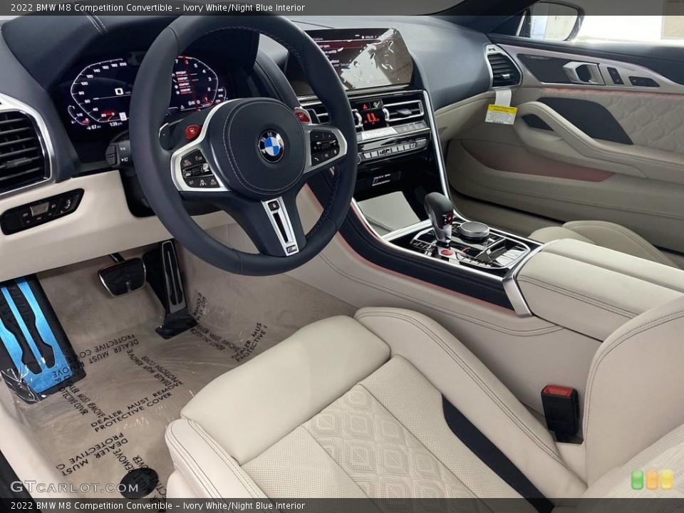 Ivory White/Night Blue Interior Photo for the 2022 BMW M8 Competition Convertible #143940824