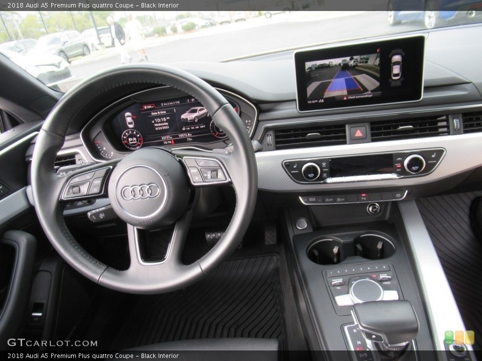 Black Interior Dashboard for the 2018 Audi A5 Premium Plus quattro Coupe #143961158