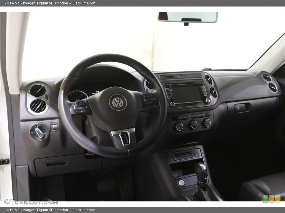 Black Interior Dashboard for the 2014 Volkswagen Tiguan SE 4Motion #143996543