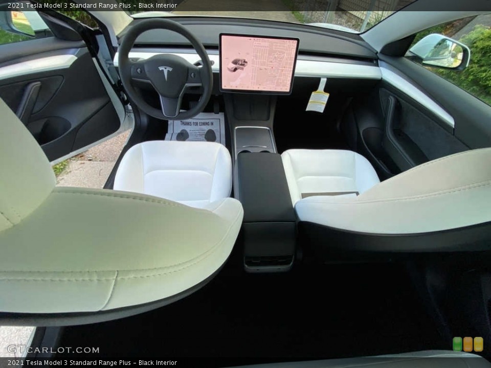 Black Interior Photo for the 2021 Tesla Model 3 Standard Range Plus #144047872