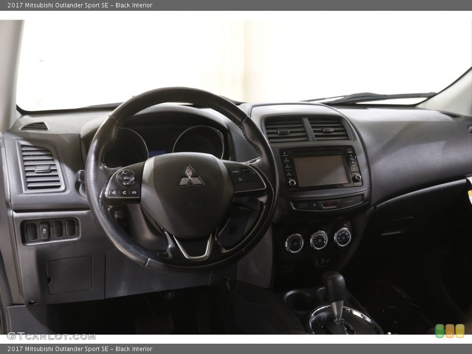 Black Interior Dashboard for the 2017 Mitsubishi Outlander Sport SE #144050263
