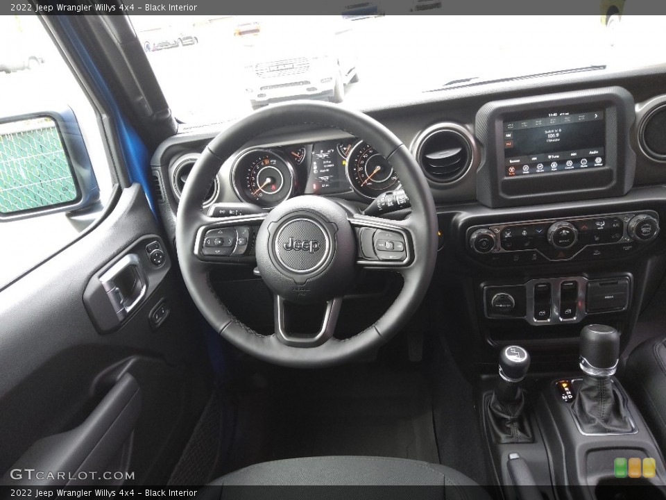 Black Interior Dashboard for the 2022 Jeep Wrangler Willys 4x4 #144071360